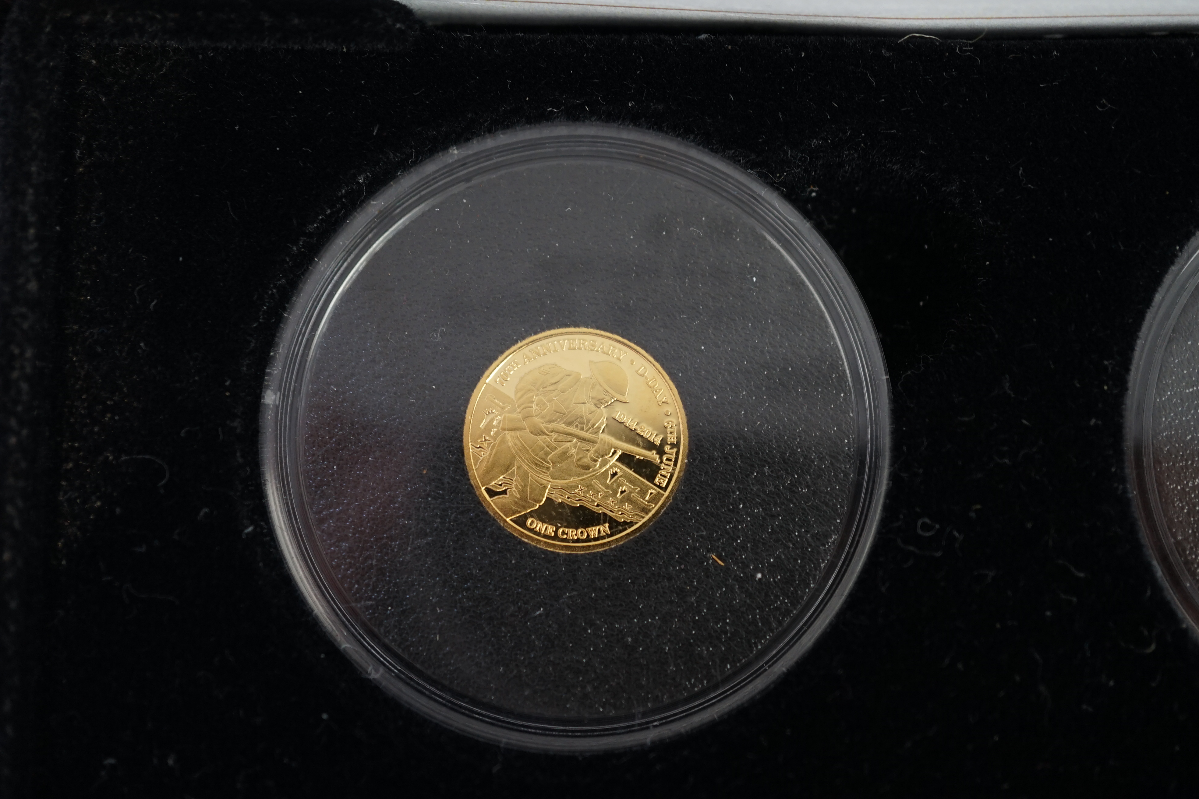 Gold commemorative coins, Elizabeth II, Tristan da Cunha, The route to victory 9ct. gold crown four coin collection, each 1g and the 75th anniversary of the Battle of Britain 9ct. gold crown pair, each 1g, each set in a
